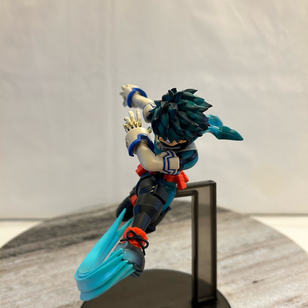 Dynamic Action Figure with Blue and Black Accents